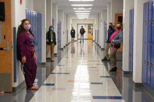 Teachers in masks in hallway